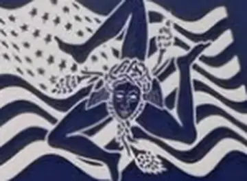 The Sicilian-American flag from the Giovanni's banner — the Sicilian trinacria woven into the stars and stripes